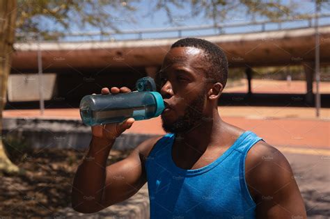 Man drinking water | Stock Photos ~ Creative Market