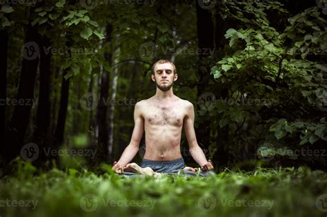 Yoga man meditating at sunset. Male model of meditation in serene harmony 7293198 Stock Photo at ...