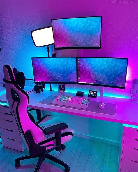 What do you think about this RGB theme? 🤔 [via @miss.debsy] This is a clean triple monitor setup ...
