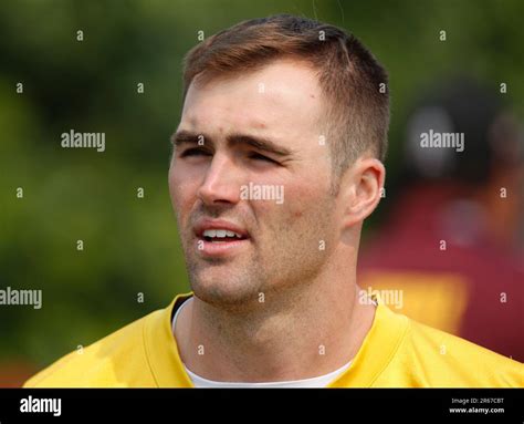 Washington Commanders quarterback Jake Fromm walks to the field before ...