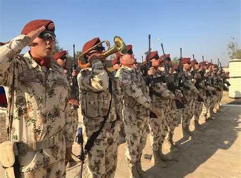 Colombian soldiers in desert uniform at a ceremony in Sinai Peninsula (Instagram @fuerzasmilcol ...