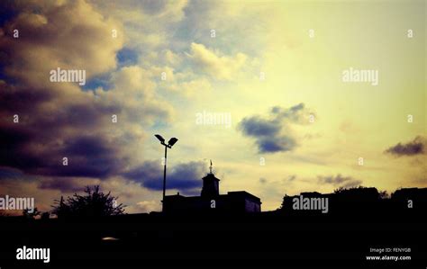 Silhouette Of Building During Sunset Stock Photo - Alamy