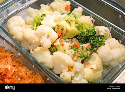 Cauliflower stew in glass tray Stock Photo - Alamy