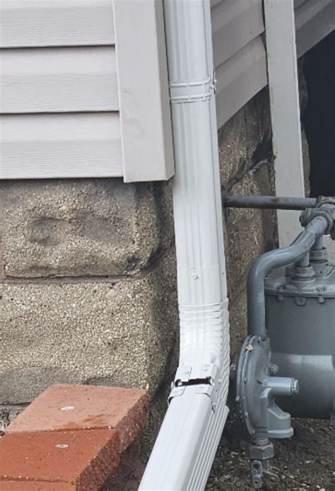 Common Downspout Shortcuts and Problems | Energy Masters