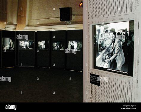 LONDON, Britain - Photos of The Beatles are exhibited inside Abbey Road Studios in London, which ...