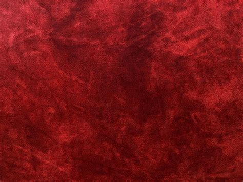 Dark red velvet fabric texture used as background. Empty dark red fabric background of soft and ...