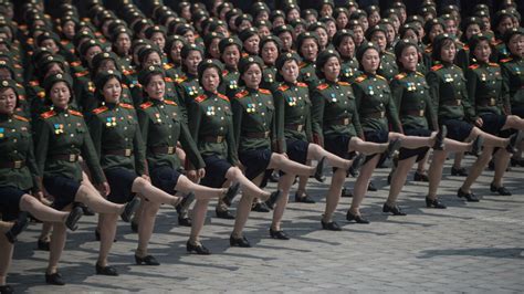 North Korea stages military parade on eve of Winter Olympics