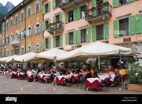 Restaurant in the town centre near the harbour, Riva del Garda, Lake Garda, Italy Stock Photo ...