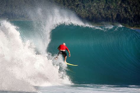 Surfing at Afulu on the west-coast of North Nias Regency. Nias Island, Indonesia. Photo by Bjorn ...