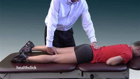 Physical therapists test for hip range of motion - YouTube