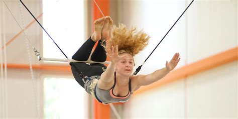 A Flying Trapeze Artist Starts Her Swing From Rest | Letter G Decoration