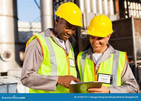 Heavy industry workers stock image. Image of employees - 31945179