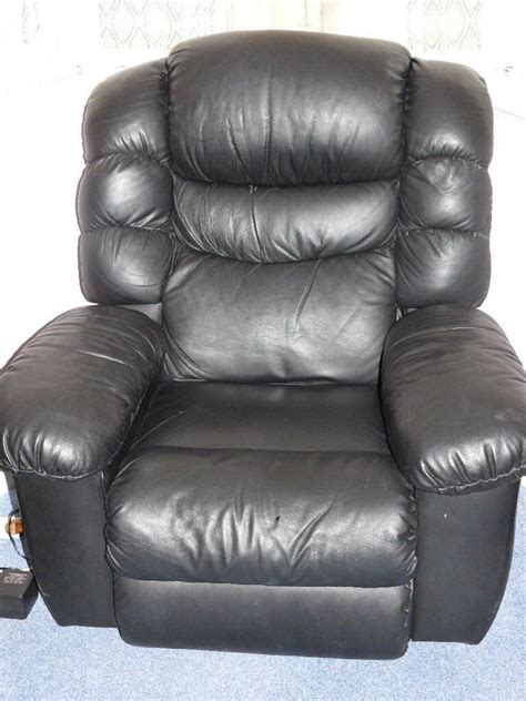 Lazy Boy black leather recliner with built in heat/back massage and fridge in the arm rest | in ...
