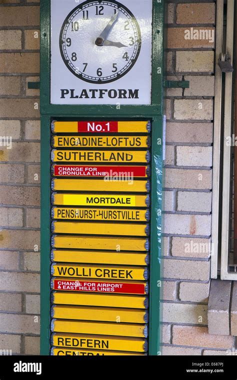 traditional timber railway timetable board at heathcote railway station in sydney,australia ...