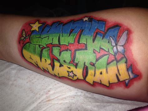 a person with a tattoo on their arm that has graffiti written all over it and stars in the ...