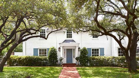 Discover the Charm of a White Brick House with White Shutters - See ...