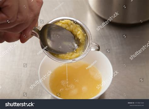 How Squeeze Juice Lemon Background Stainless Stock Photo 1413961304 | Shutterstock