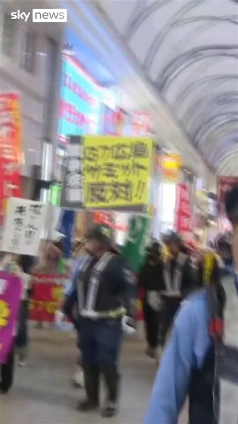 Residents in Hiroshima, Japan, protest against the G7 Summit. They ...