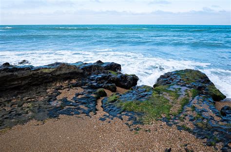 Brown Rocks on Seashore · Free Stock Photo