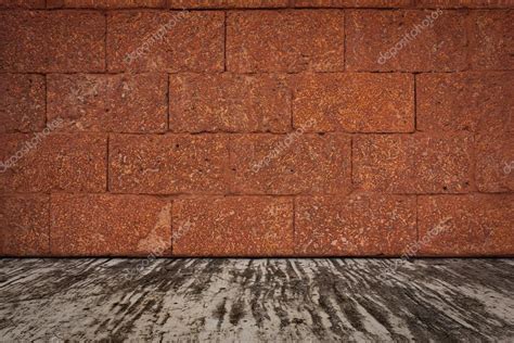 Laterite stone wall and a cement floor. Stock Photo by ©sibadanpics ...