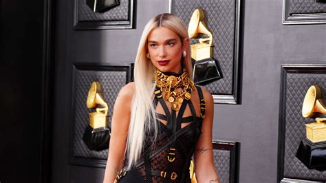 Dua Lipa Went Platinum Blonde Just Hours Before the 2022 Grammy Awards — See Photos | Allure