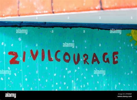 A graffiti the word moral courage in an underpass hi-res stock ...