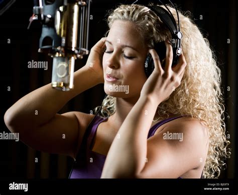 woman in a recording studio Stock Photo - Alamy
