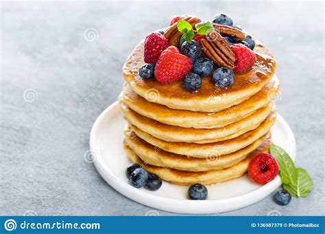 Stack of Fluffy Pancakes with Fresh Berries and Pecan Nuts Stock Image - Image of nuts, food ...