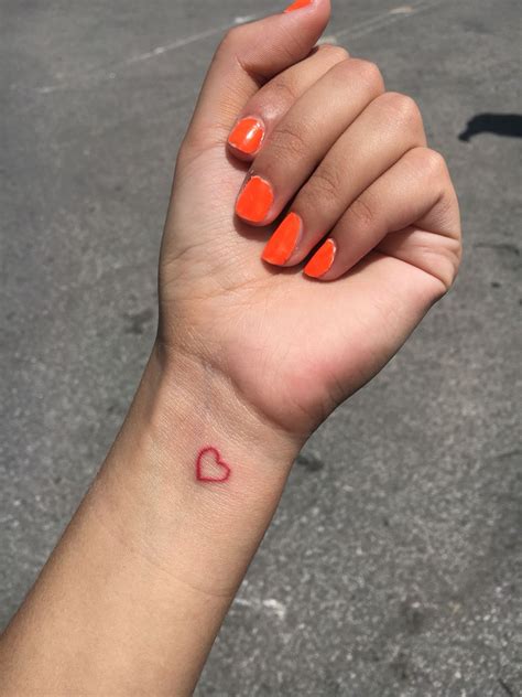 Mini red heart tattoo Gabriella Toruno | Red heart tattoos, Small heart tattoos, Heart tattoo wrist