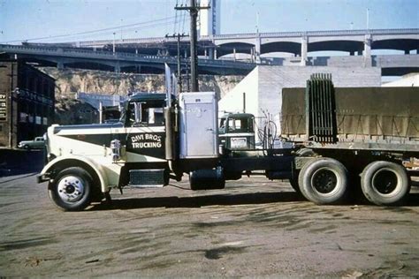 Old Peterbilt Truck Parked in Front of Concrete Structure