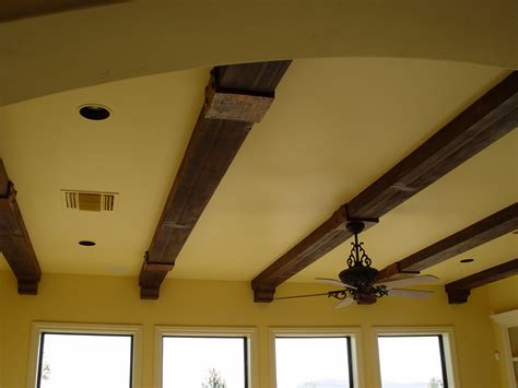 ELEVATE YOUR CEILINGS WITH FAUX WOOD BEAMS - Realm of Design Inc.