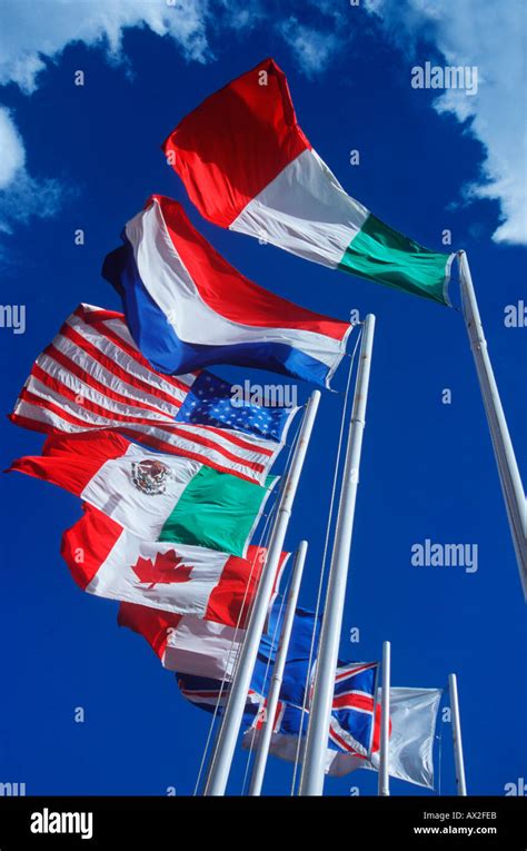 Various international flags blowing in the wind Stock Photo - Alamy