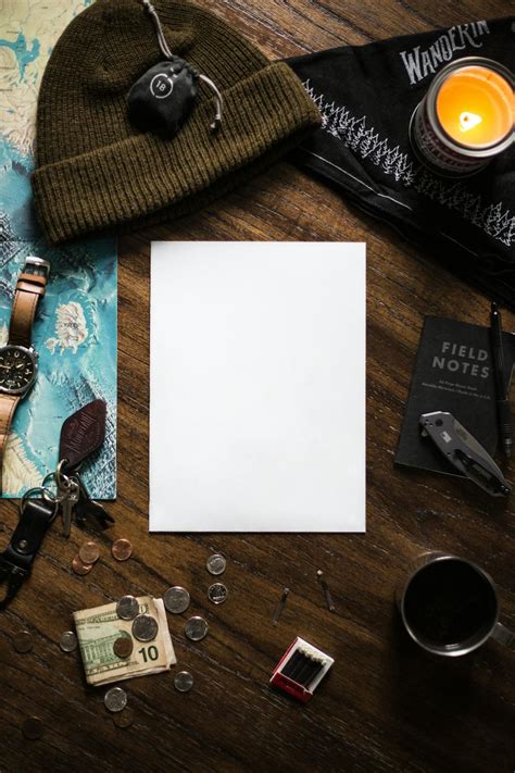 White Printer Paper on Brown Wooden Table · Free Stock Photo