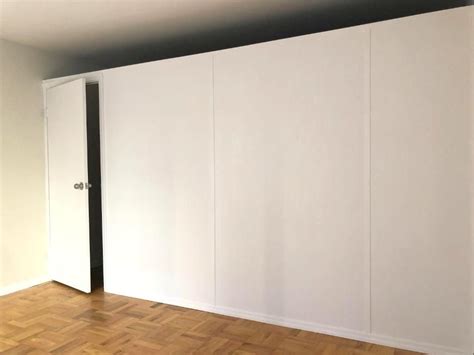 Temporary wall with swing door. Call us for all your custom room ...