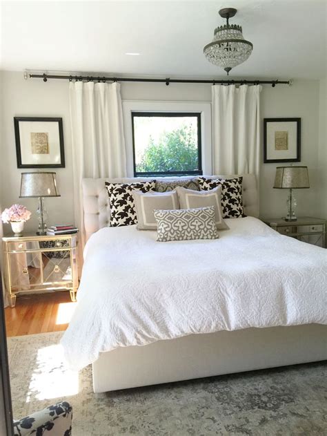 Neutral bedroom. Window behind bed. Bedroom window treatments. Paint is ...