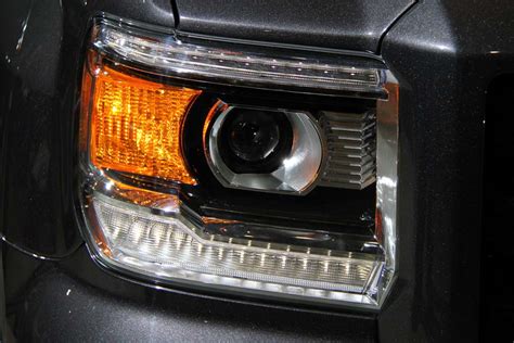 Adjust gmc envoy headlights