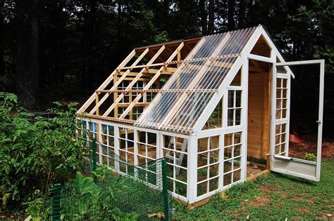 Custom Backyard Greenhouse with Recycled Windows