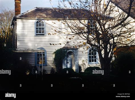 Epsom Surrey Weatherboarded Cottage Stock Photo - Alamy