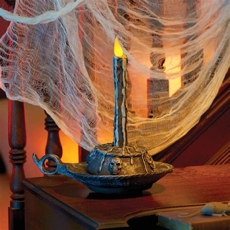 Floating Candle Halloween Prop | Floating candles halloween, Halloween props, Halloween candles