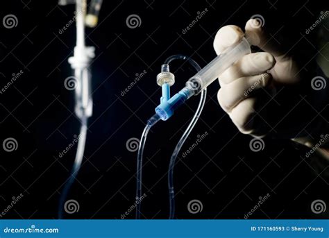 IV Medication Push by Syringe into Medication Port Stock Image - Image ...