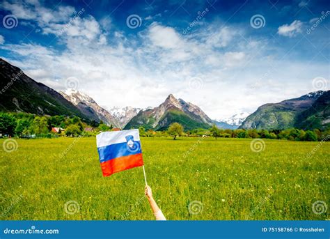 Slovenian Landscape with Flag Stock Photo - Image of grass, hand: 75158766