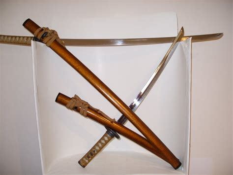 Two Japanese swords with wooden sheath , a Katana and a Wakizashi - Catawiki