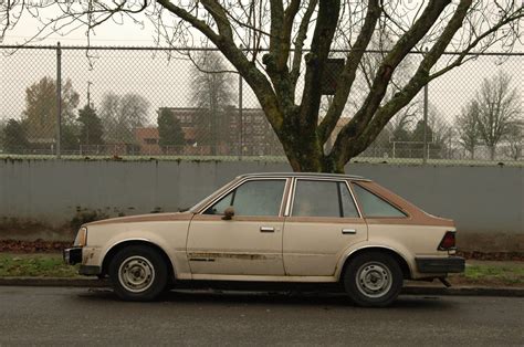 OLD PARKED CARS.: 1982 Mercury Lynx GL 5-Door Hatchback.