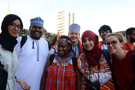 This picture shows people from different cultures all together as friends, despite their ...