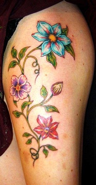 clematis tattoo - Google Search | Vine tattoos, Forearm flower tattoo, Flower vine tattoos