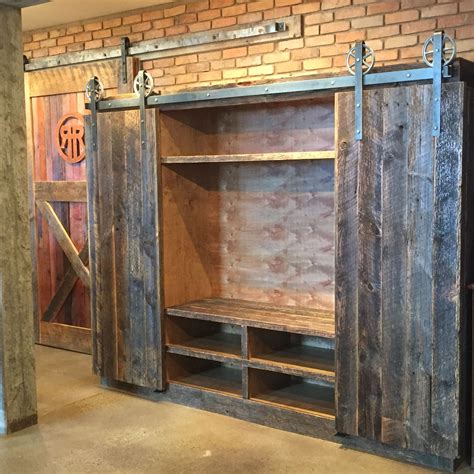 Bob's entertainment center. Crafted with reclaimed barn wood. Rolling barn wood doors Barn Door ...