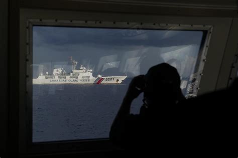 Tense face-off: Philippines confronts China over sea claims | AP News