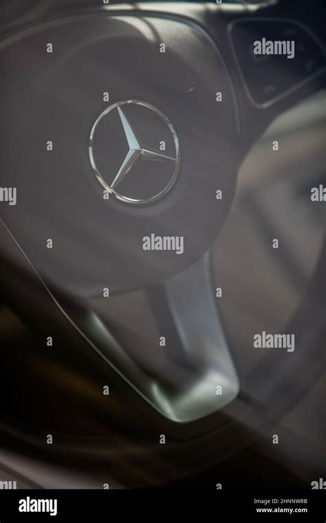 Mercedes Benz logo on a steering wheel Stock Photo - Alamy