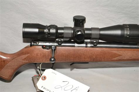 Savage Model 93 R17 .17 HMR Cal Mag Fed Bolt Action Rifle w/ 21" bull bbl [ blued finish, few marks,