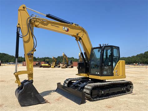 2022 CAT 310 Excavator - J.M. Wood Auction Company, Inc.